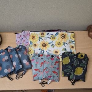 Lot Of Small Cosmetic Bags And Reusable Full Size Shopping Totes.